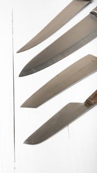 kitchen knife over white table background