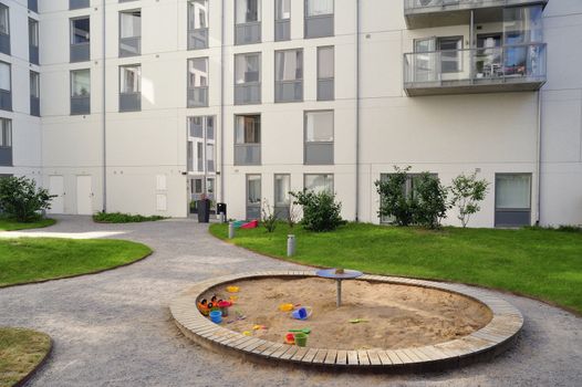 Modern apartment building with playground