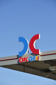 STOCKHOLM - MAY 1 2013: A OKQ8 sign on the roof of a gas station on may 1th 2013 in Stockholm, Sweden. OK-Q8 AB is a Swedish company which since 1999 operates Sweden's largest chain of gas station