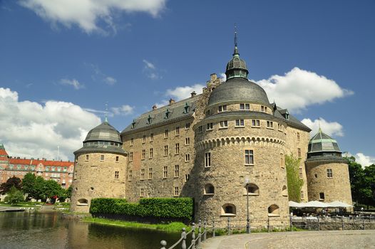Orebro castle in Örebro city, Sweden. Old castle with a very interesting history. The castle is in the center of Örebro along Svartån, a small river.