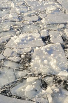 Broken up ice surface on a lake