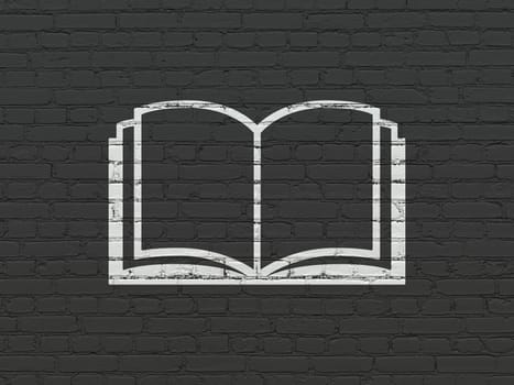 Studying concept: Painted white Book icon on Black Brick wall background