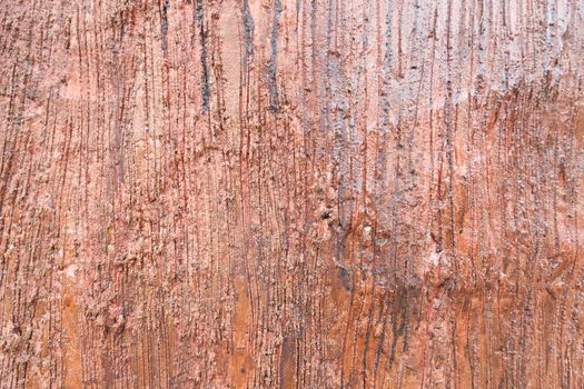 Background cement. Scroll pattern made of wood and painted to look like wood.