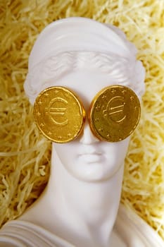  Greek crisis. The Greek goddess Aphrodite with euro coins on the eyes