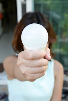 LED bulb - in woman hand