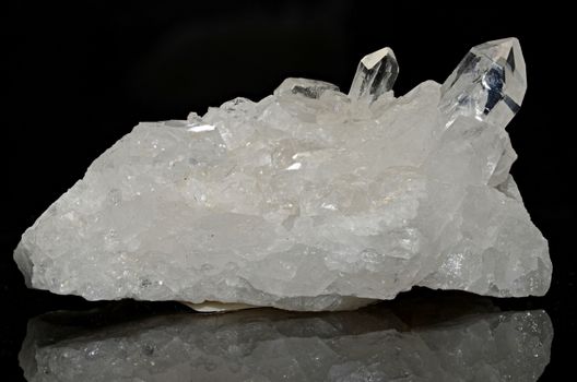 Sample of clear quartz cluster a beautiful nature specimen isolated on black  background
