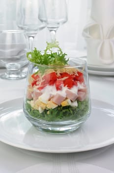 Salad of lettuce with egg, ham, tomatoes, dressed   yogurt and cheese