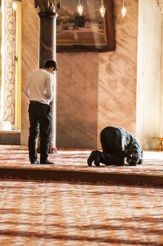 ISTANBUL - FEBRUARY 9: muslims pray inside the Blue Mosque on February 9, 2013 in Istanbul 