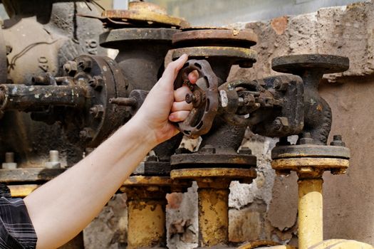 Closeup shot of big rusted valve industrial site