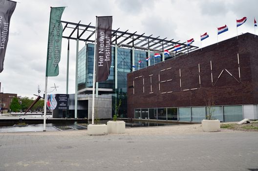 Rotterdam, Netherlands - May 9, 2015: People visit Het Nieuwe Institut museum on May 9, 2015 in Rotterdam, Netherlands. This museum is a cultural institute for architecture and urban development.