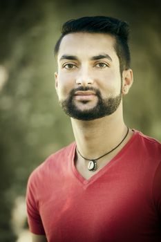 An image of a young man with a beard