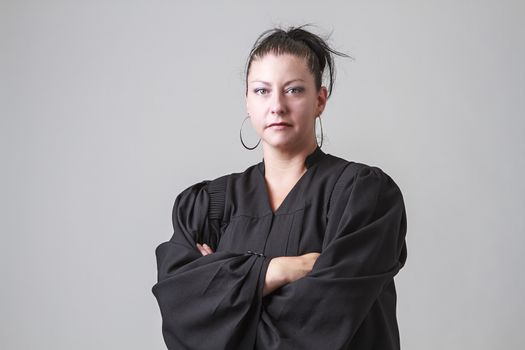 Preacher woman with her arm cross with serious look