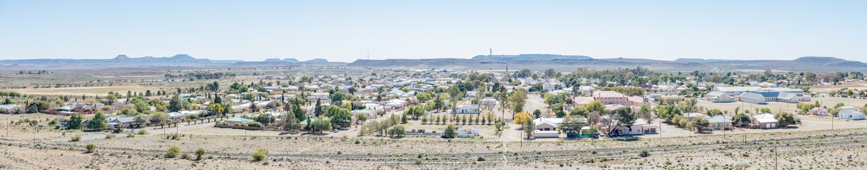 CARNAVON, SOUTH AFRICA - AUGUST 10, 2015: Stitched panorama of Carnavon, a small town in the Northern Cape Karoo region of South Africa. Photo shot from the blockhouse on Koeelkop (bullet hill)