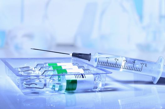 plastic medical syringe and ampoule with needle  before make drug injection