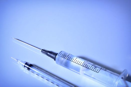 plastic medical syringe and ampoule with needle  before make drug injection