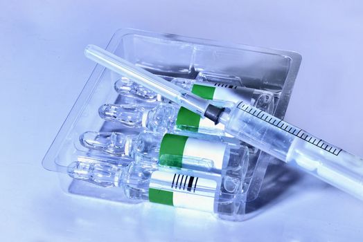 plastic medical syringe and ampoule with needle  before make drug injection