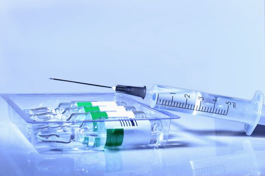 plastic medical syringe and ampoule with needle  before make drug injection