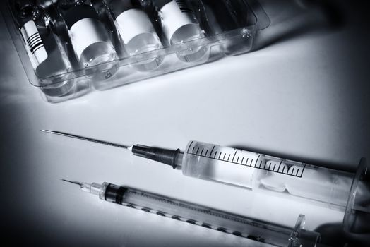 plastic medical syringe and ampoule with needle  before make drug injection