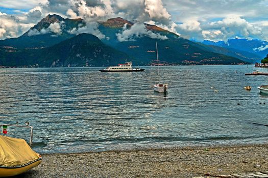 Small beach in Varenna on Lake Como, Italy, in a cloudy day