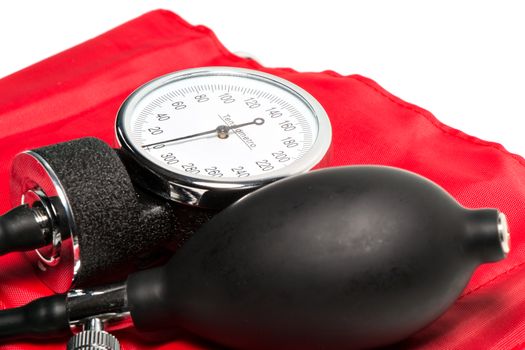 red Blood pressure cuff, close-up isolated