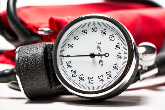 red Blood pressure cuff, close-up isolated