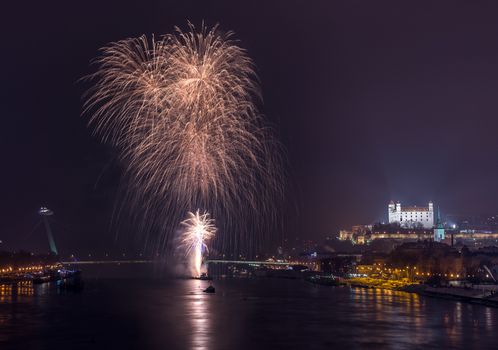 New Year Celebration. Fireworks on the River in Bratislava, Slovakia.