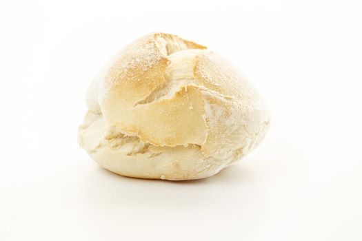 Fresh white bread over a white background.