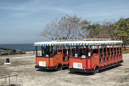 Travia buses waitigin for turists in Corregidor Island, one of the most historically-rich island in the Philippines. 