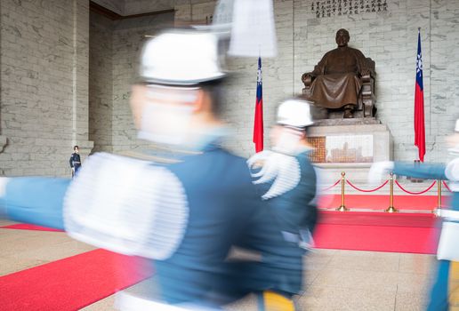 Taipei, Taiwan - May 8, 2014:Honor Guard marching  at the Chiang Kai-Shek Memorial Hall in Taipei. Chiang Kai-shek Memorial Hall is a popular travel destination among tourists visiting Taiwan. Chiang Kai-shek, former President of Taiwan. 