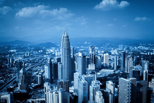 Kuala Lumpur skyline with the Petronas Towers and other skyscrapers. 