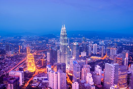 Kuala Lumpur skyline with the Petronas Towers and other skyscrapers. 