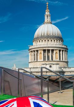 Beautiful view of St. Paul Cathedral with england flag.