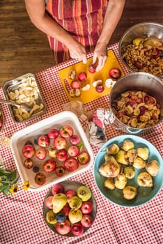 looking down at woman preparing fruit