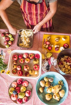 looking down at woman preparing fruit