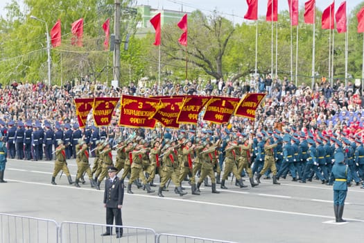 Samara, Russia - May 9: Russian soldiers march at the parade on annual Victory Day, May, 9, 2015 in Samara, Russia.
