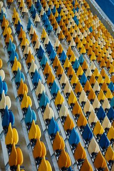 The blue anf yellow empty chair on sport stadium