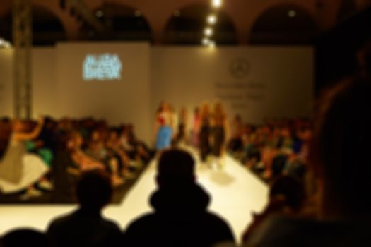 Fashion runway out of focus. The blur background