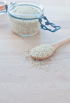 Filling a glass of quinoa grain from the Andes