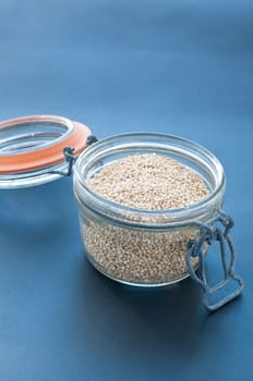 Filling a glass of quinoa grain from the Andes