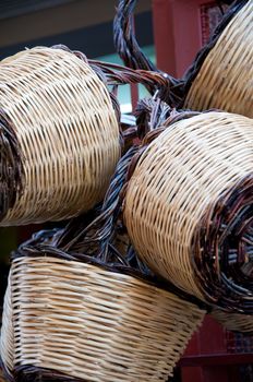 Group of handmade baskets straw attached to the door