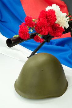 Machinegun and flowers