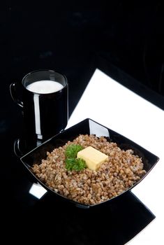 Boiled buckwheat and a glass of milk