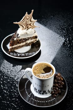 Coffee and chocolate cake on a glass background