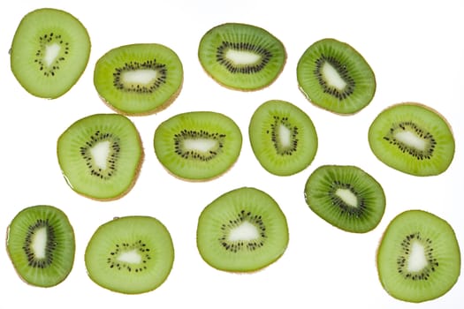 Pieces of kiwi on white background