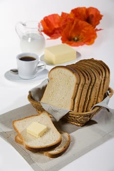 Bread, glass of milk and poppy