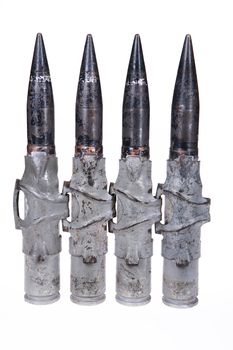Cartridges for big caliber machinegun on isolated background