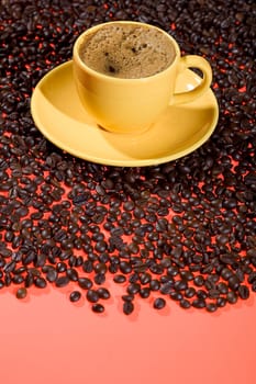 Cup of coffee and coffee beans