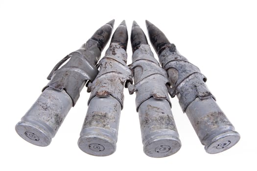 Cartridges for big caliber machinegun on isolated background