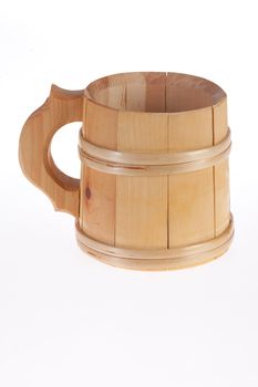 Traditional Russian handmade wooden mug on isolated background