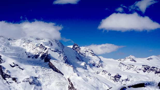 snow alps mountains and blue sky, matterhorn, zermatt, switzerland